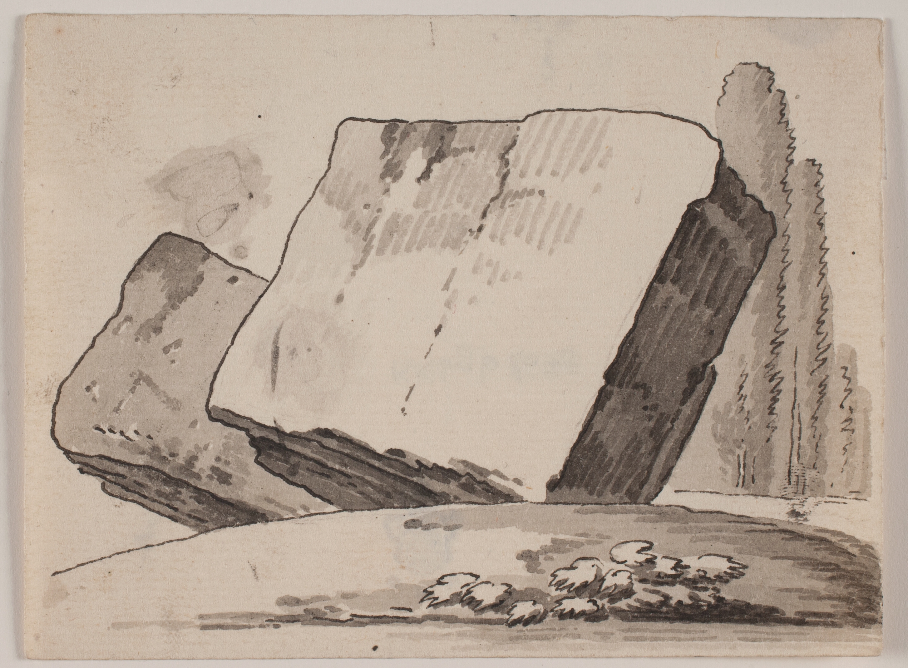 Ruinfragmenter og cypresser