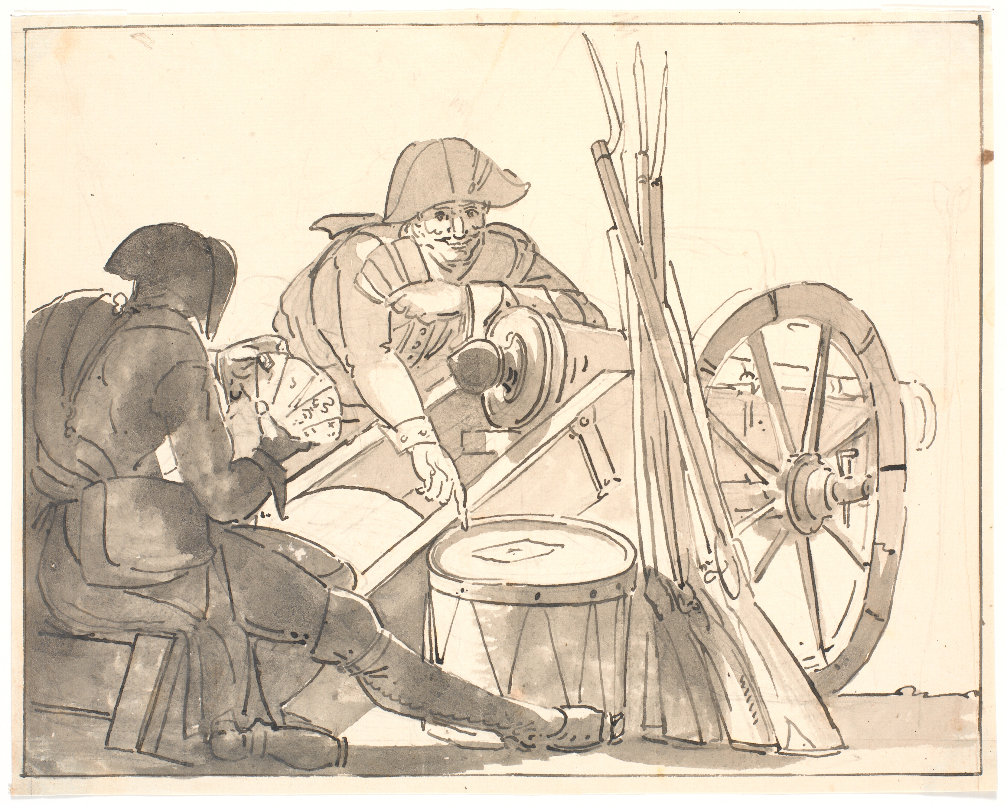 To soldater spiller kort ved en kanon