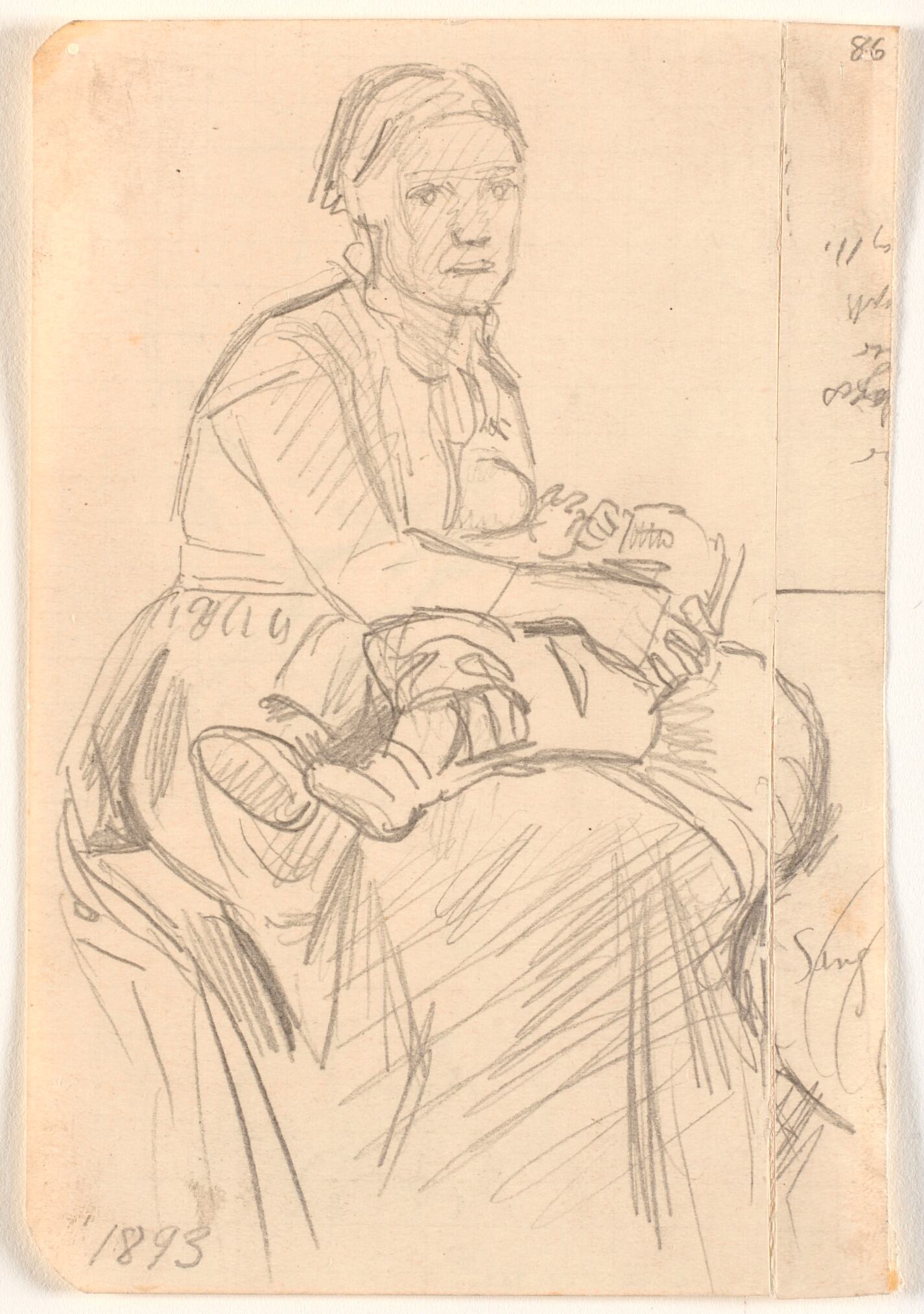 Siddende kvinde med barn på skødet