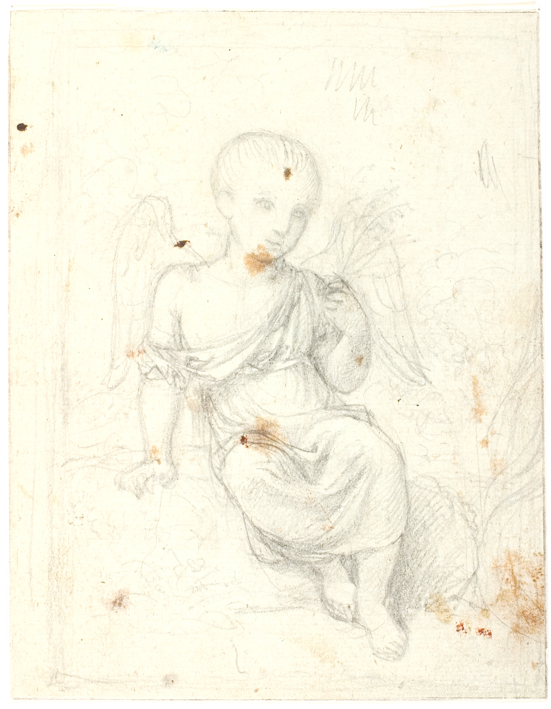 Siddende barn med englevinger