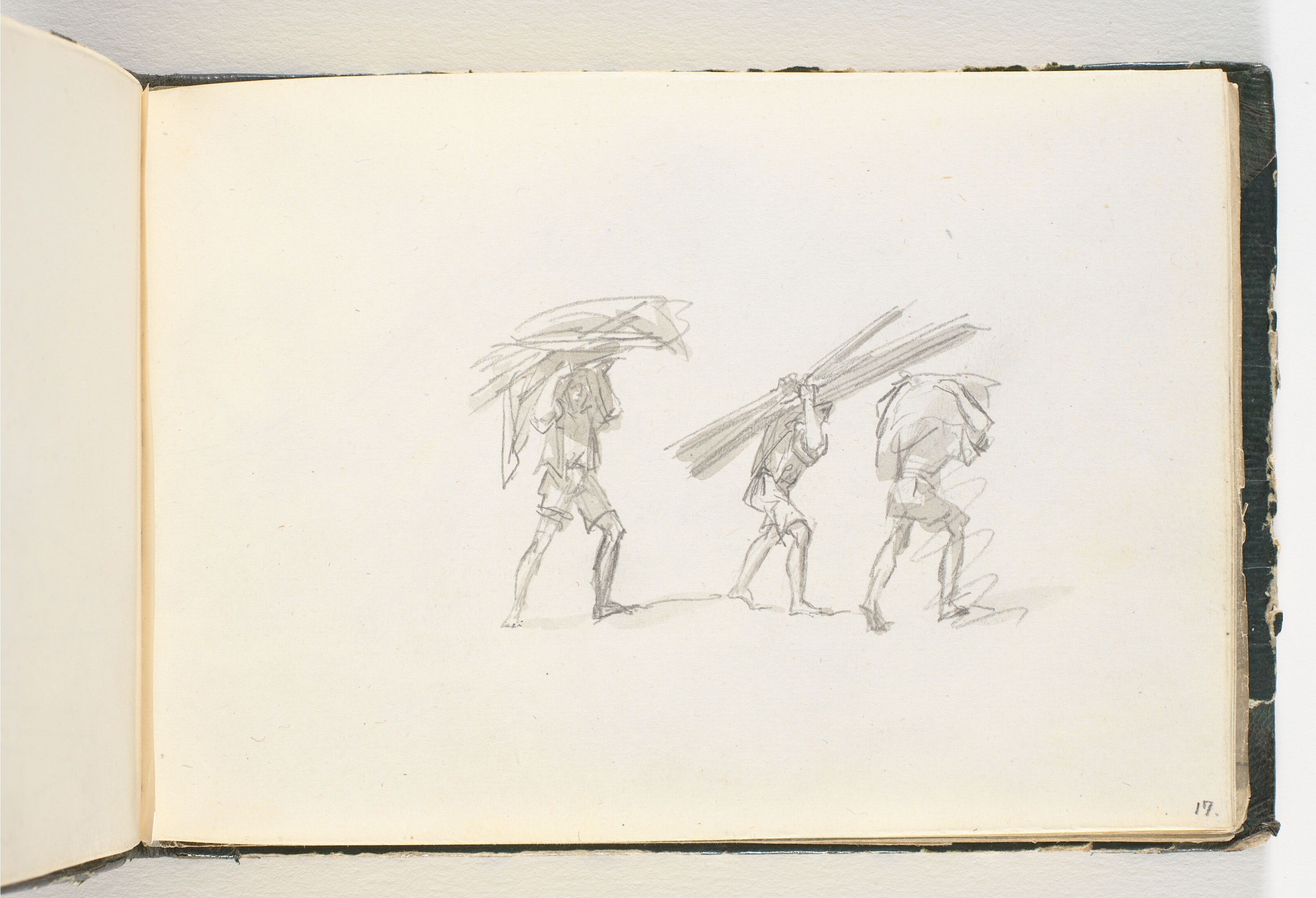 Tre mænd, der bærer store byrder på nakken og hovedet