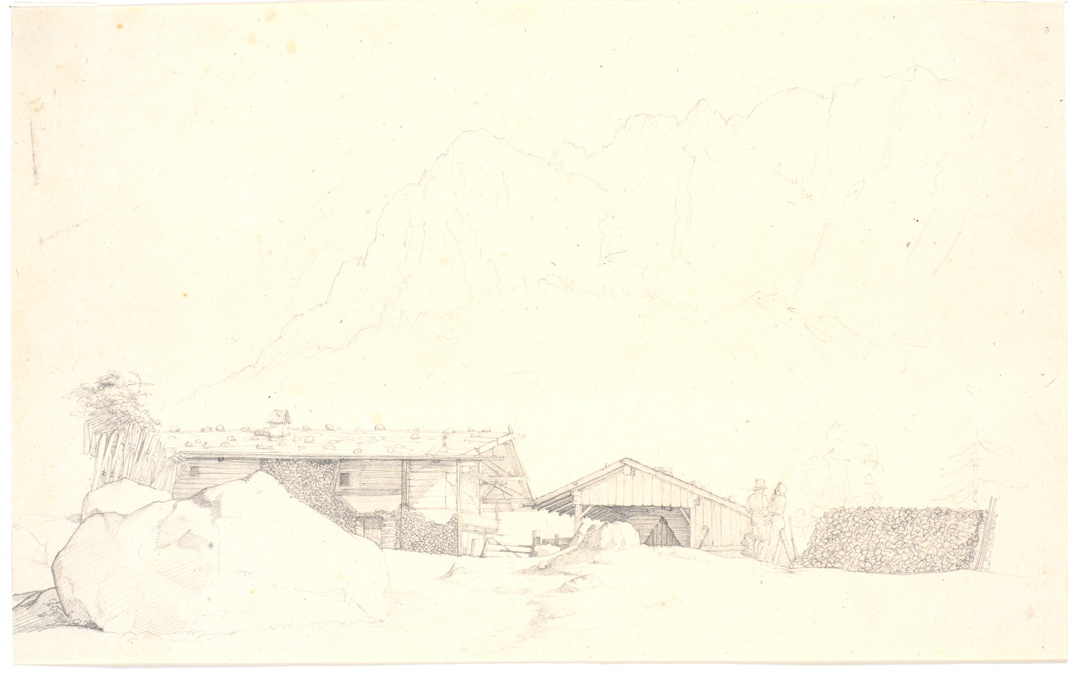 Træhuse. Bjerge i baggrunden