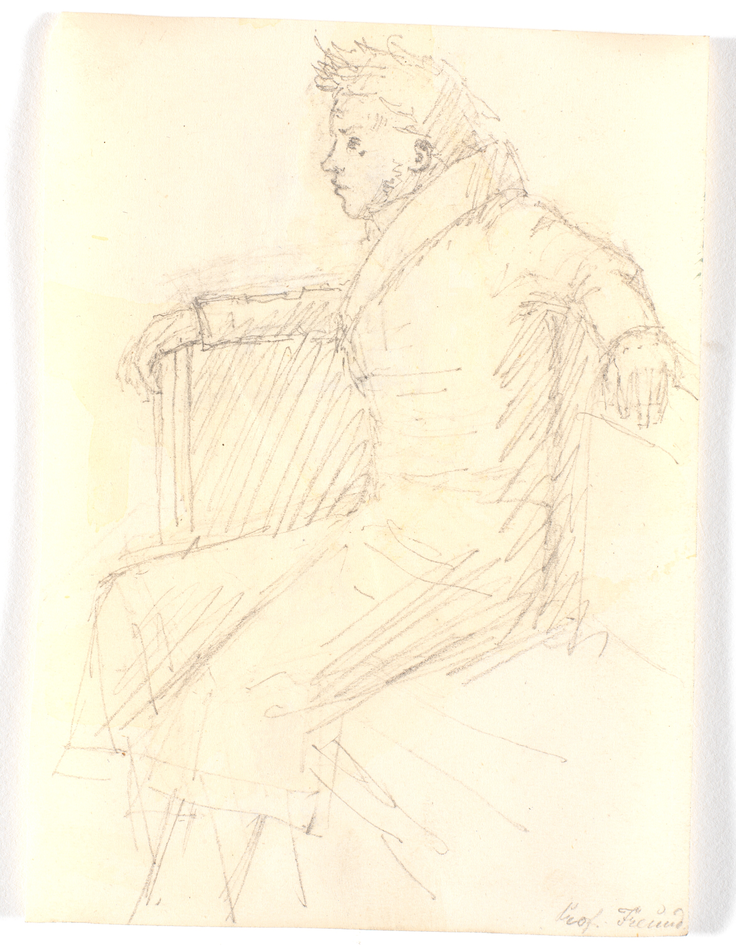 H.E. Freund siddende i en sofa