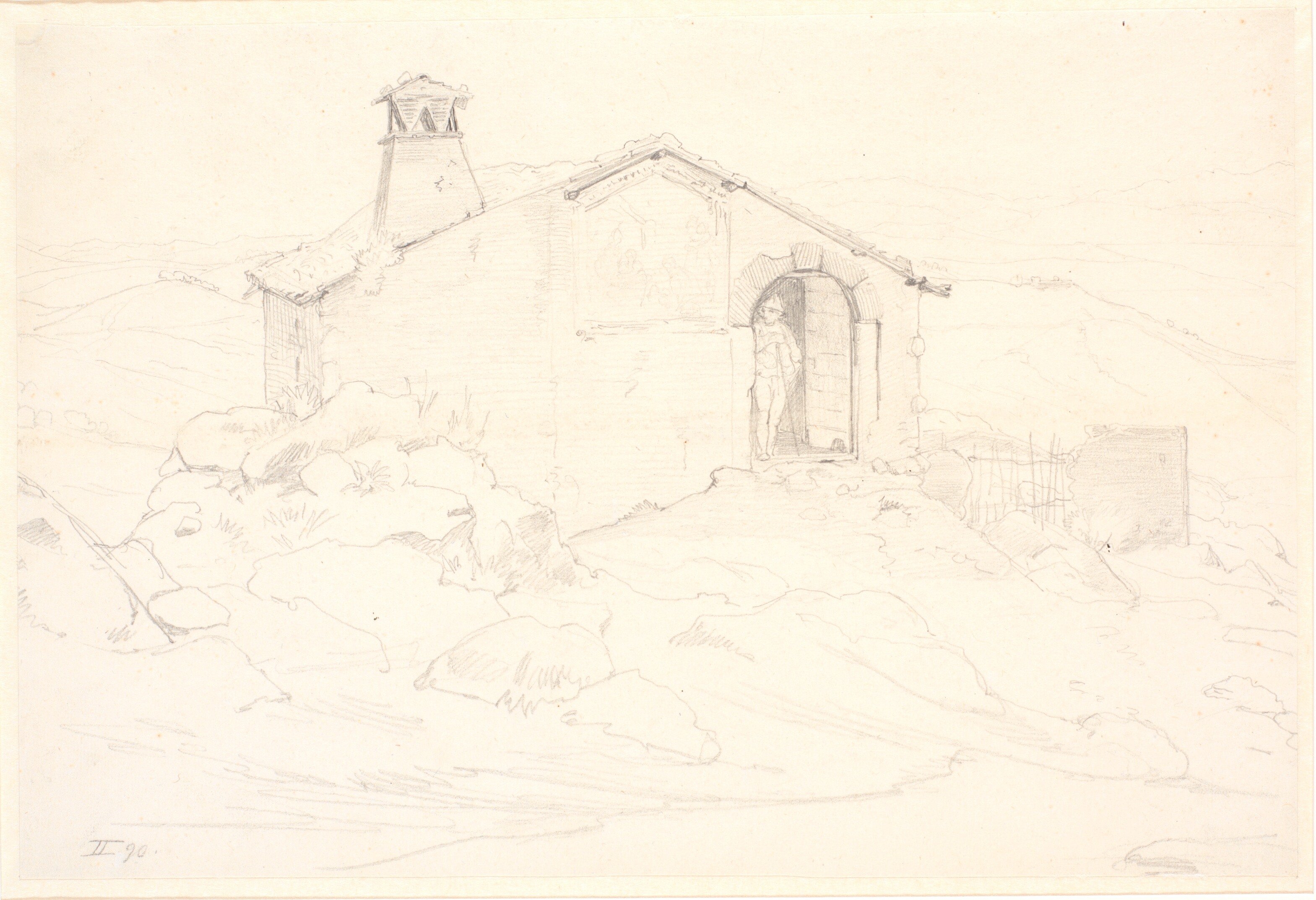 Bjerglandskab med en hytte