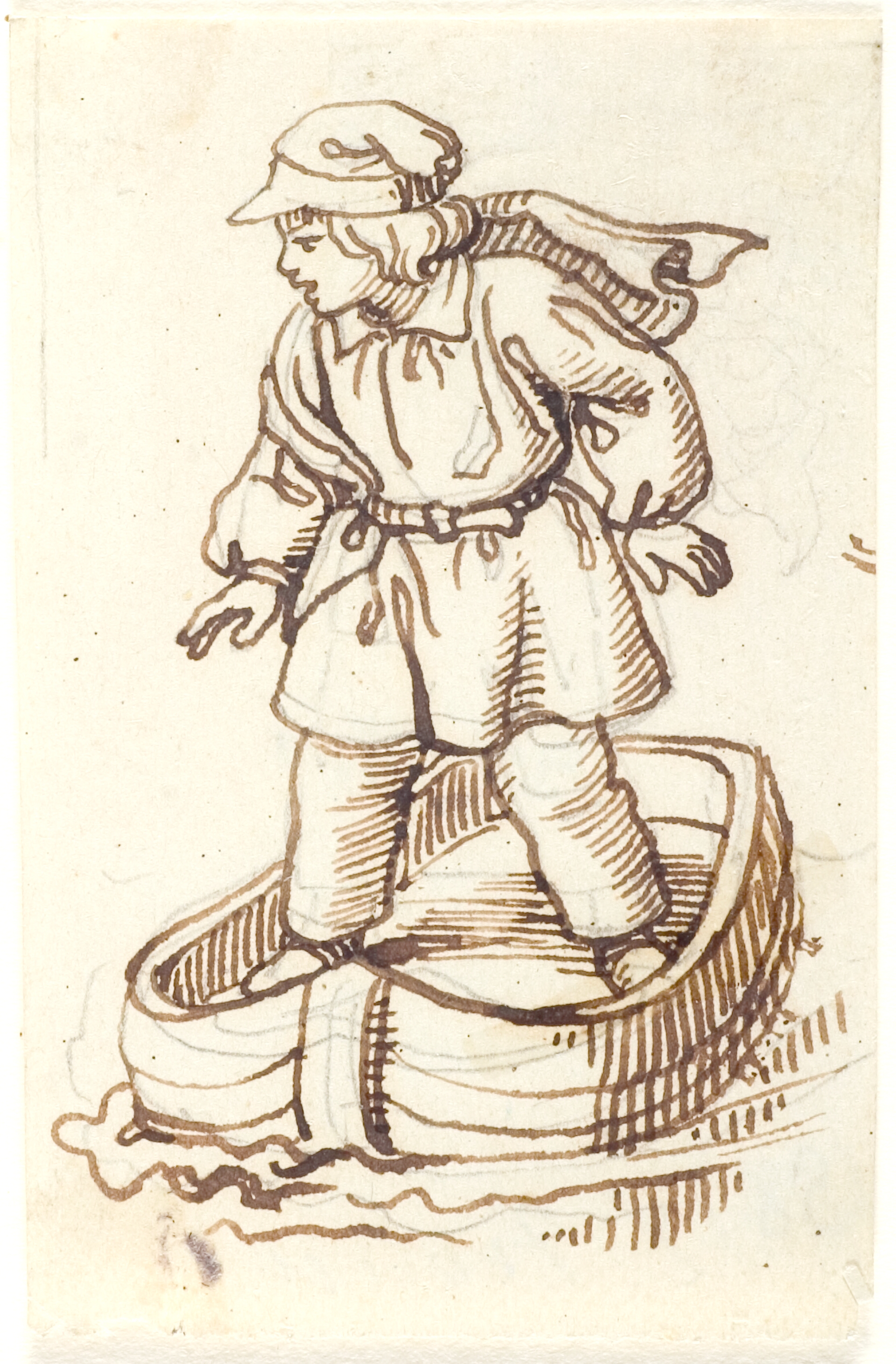 Stående dreng i en båd