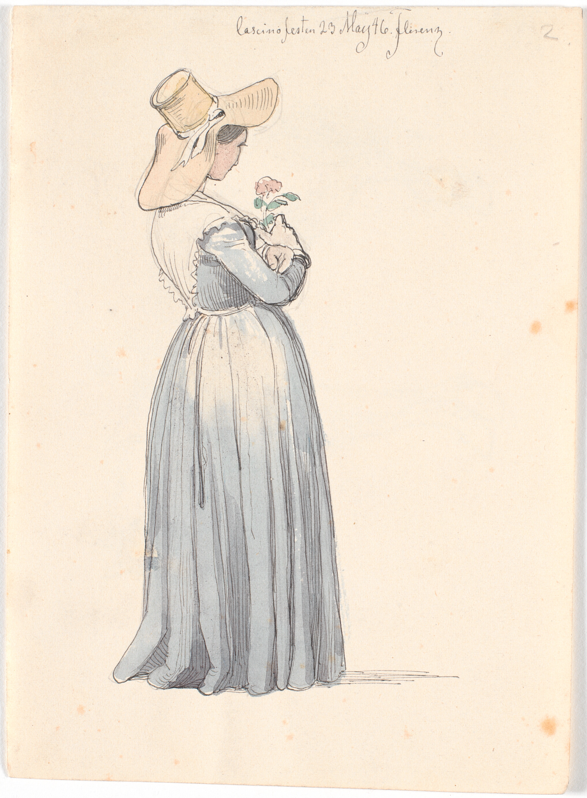 Staaende dame med en rose i hånden