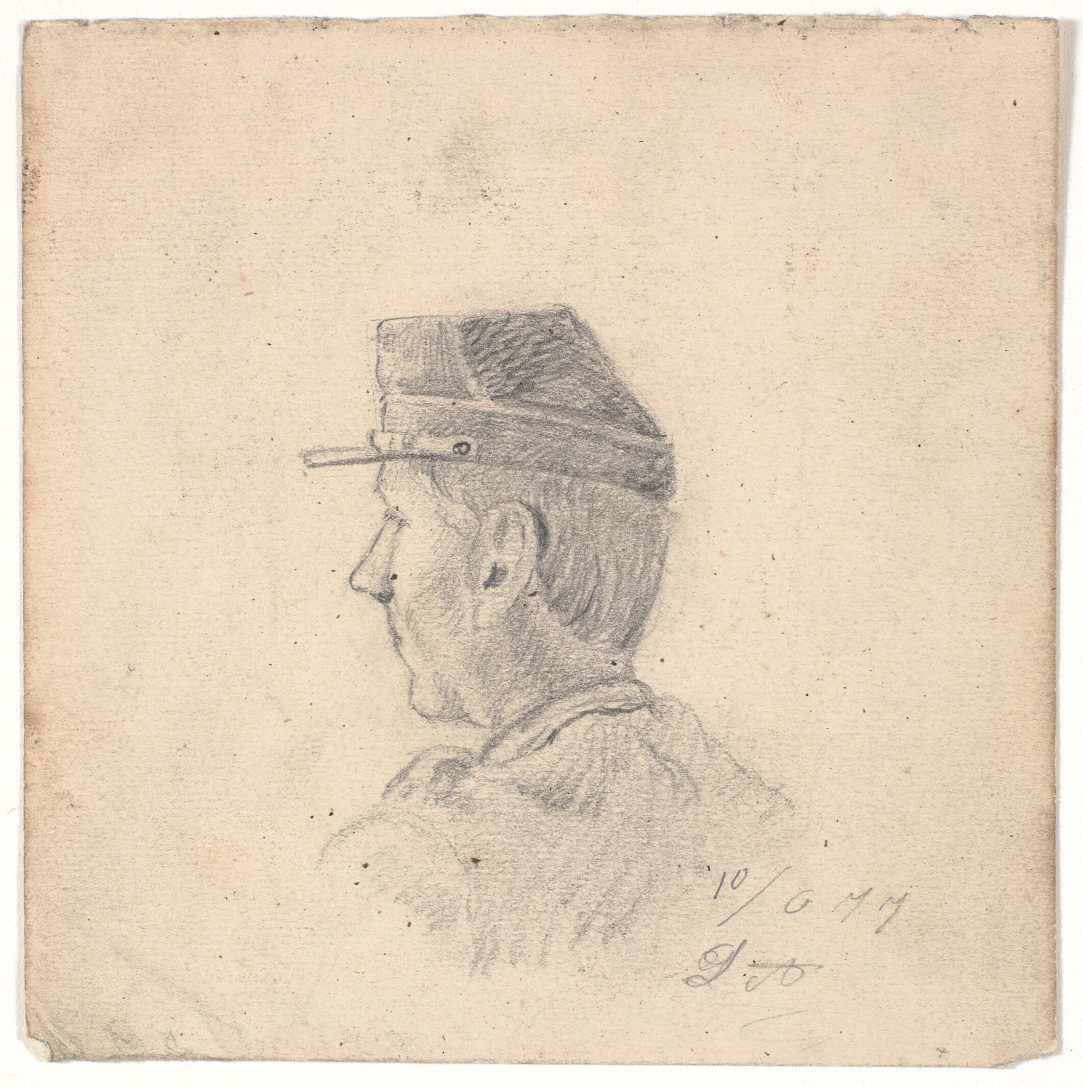 Hoved af en soldat, set skråt bagfra