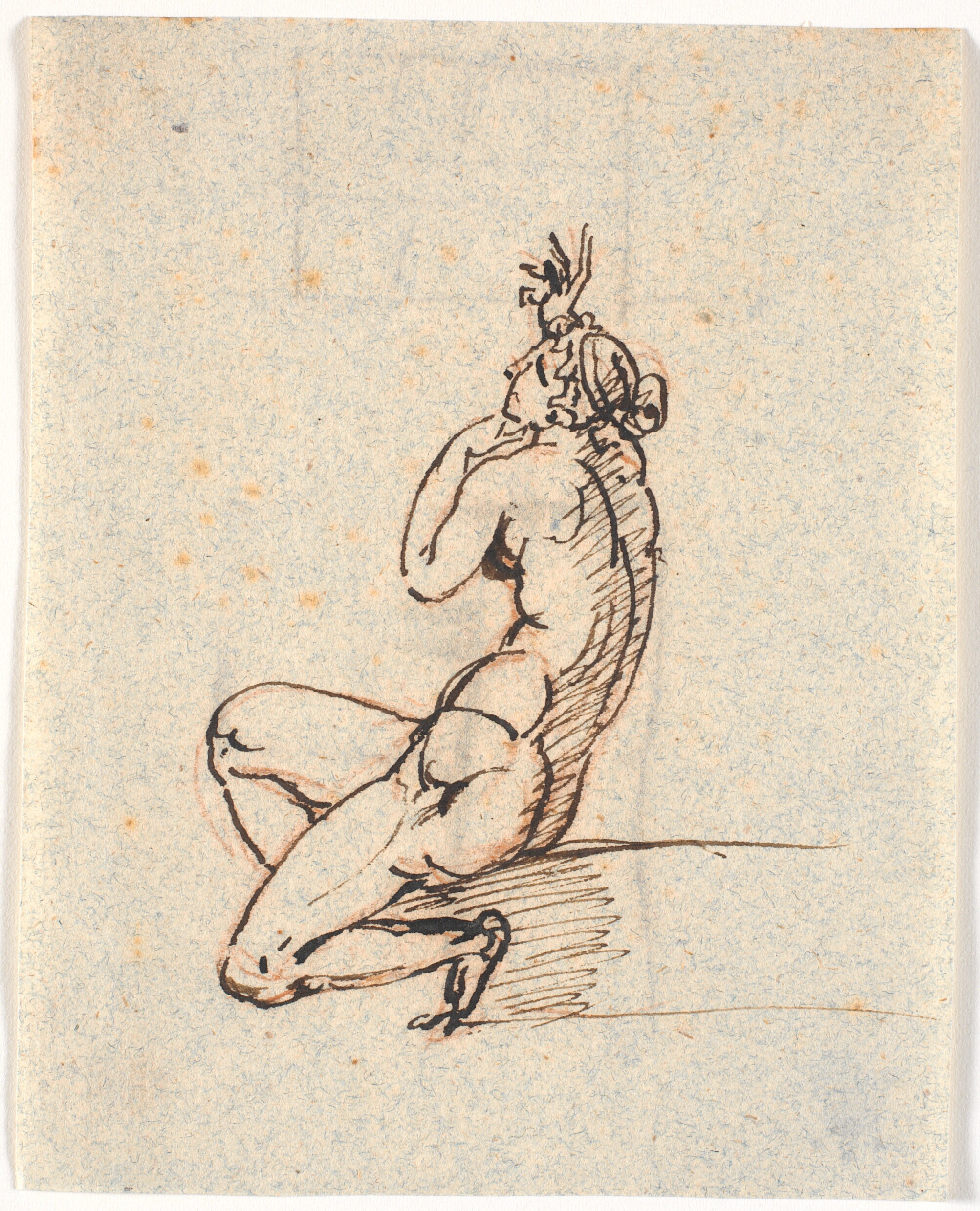 En nøgen siddende kvinde, vendt mod venstre, med oprakt højre hånd