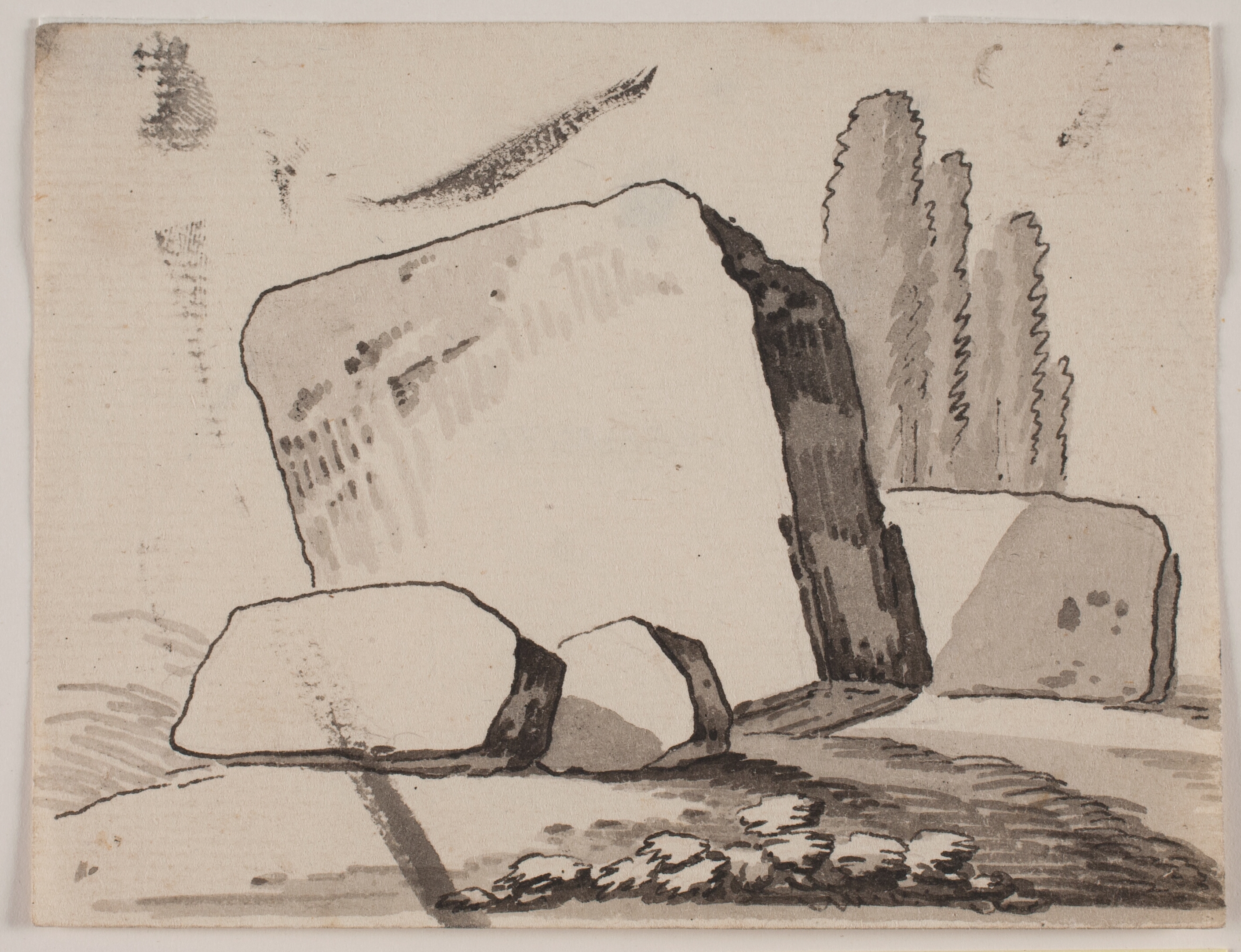 Ruinfragmenter og cypresser