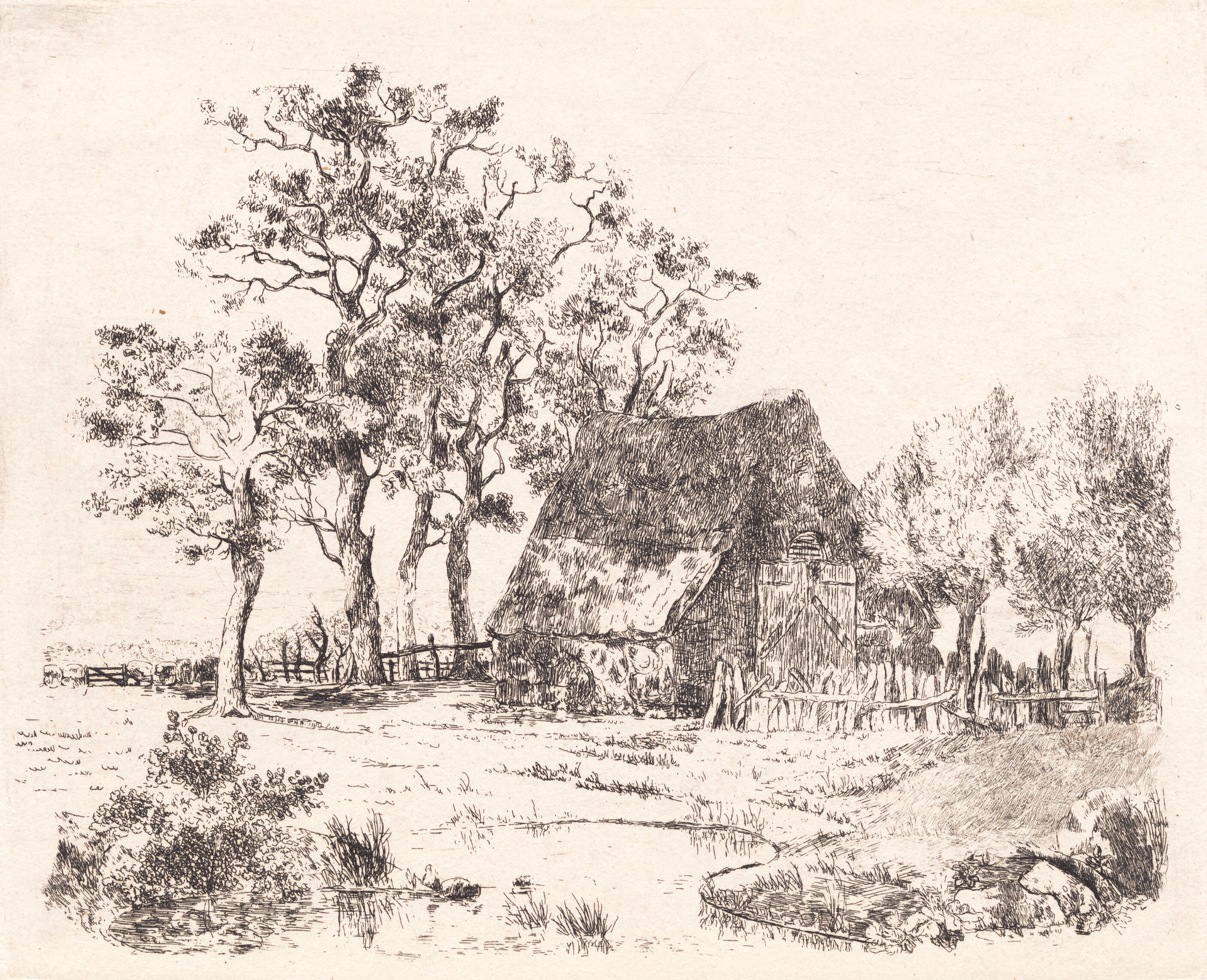 Et stråtækt hus imellem træer