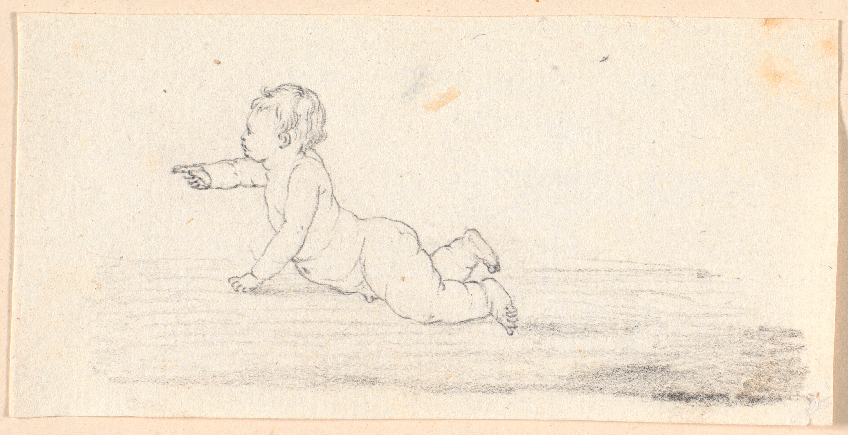 En kravlende, nøgen dreng