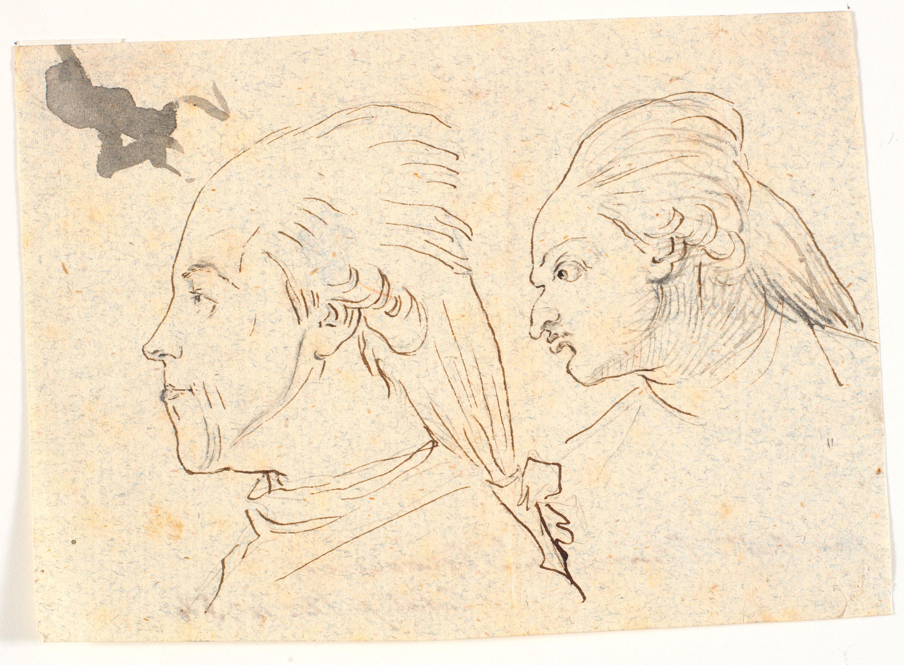 To karrikerede herreportrætter i profil til venstre