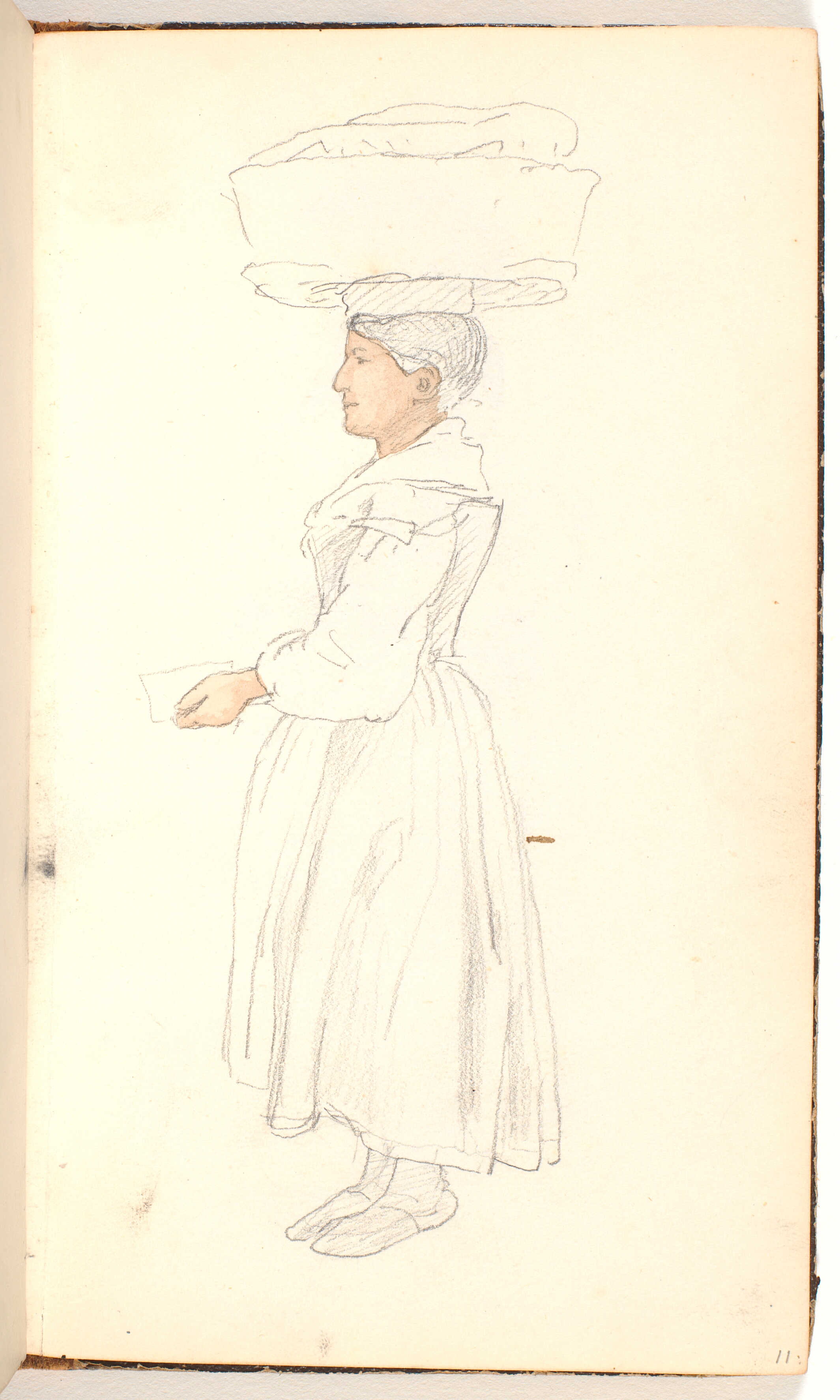 Italiensk kvinde med en stor kurv på hovedet