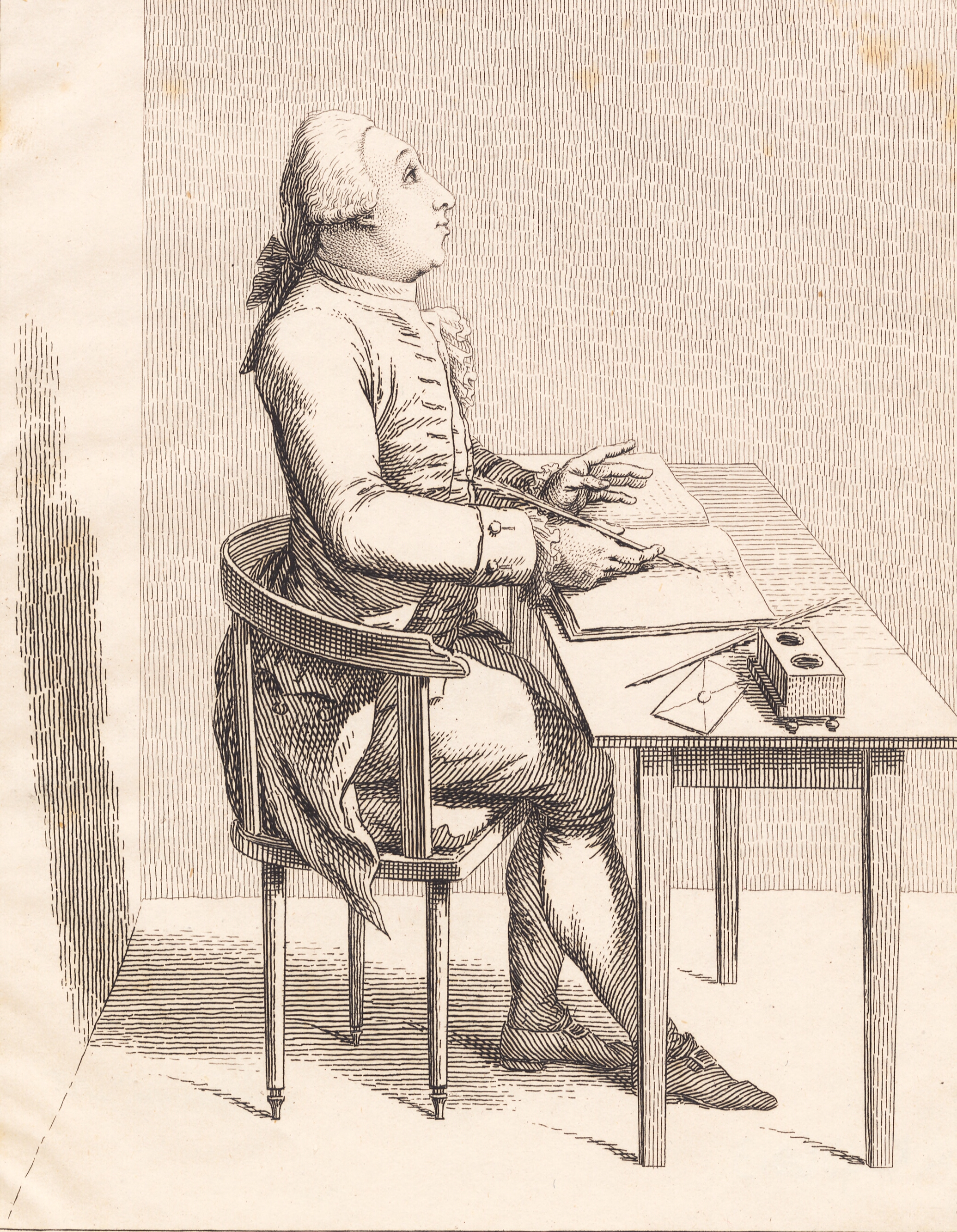 En herre ved et skrivebord