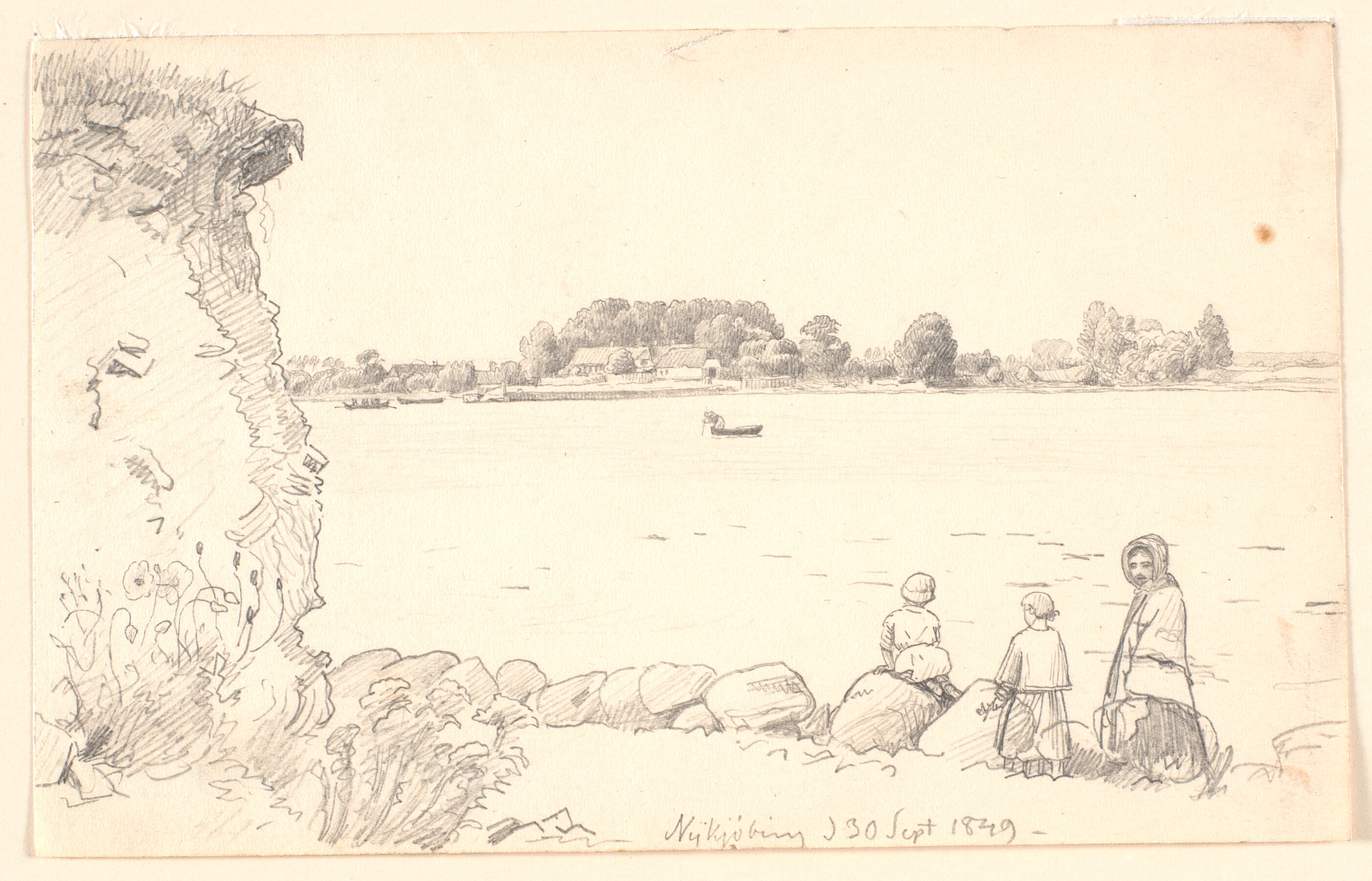 En dame og to børn ved Guldborg Sund. Nykøbing Falster.