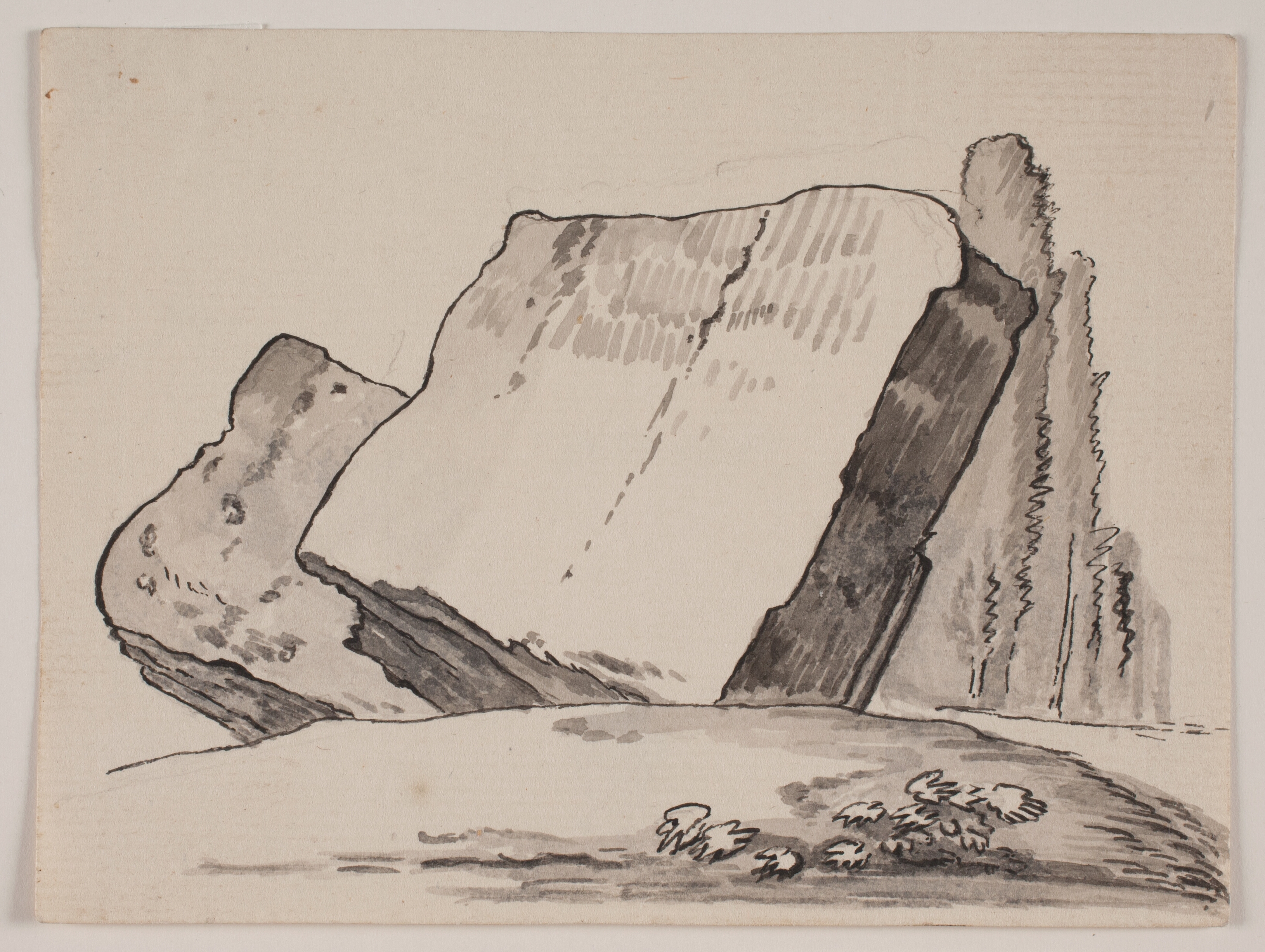 Ruinfragmenter og cypresser