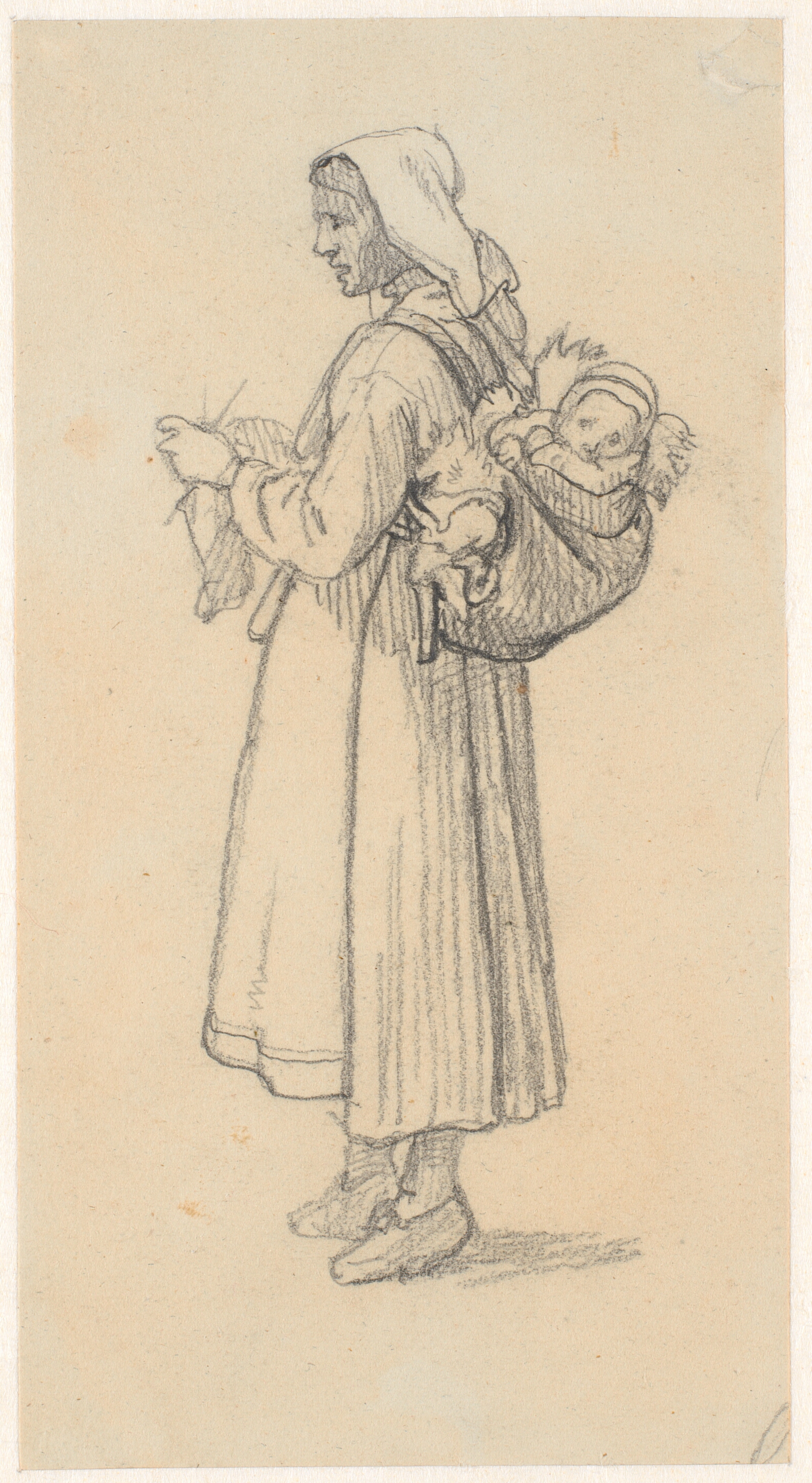 Strikkende svensk kone med et barn på ryggen