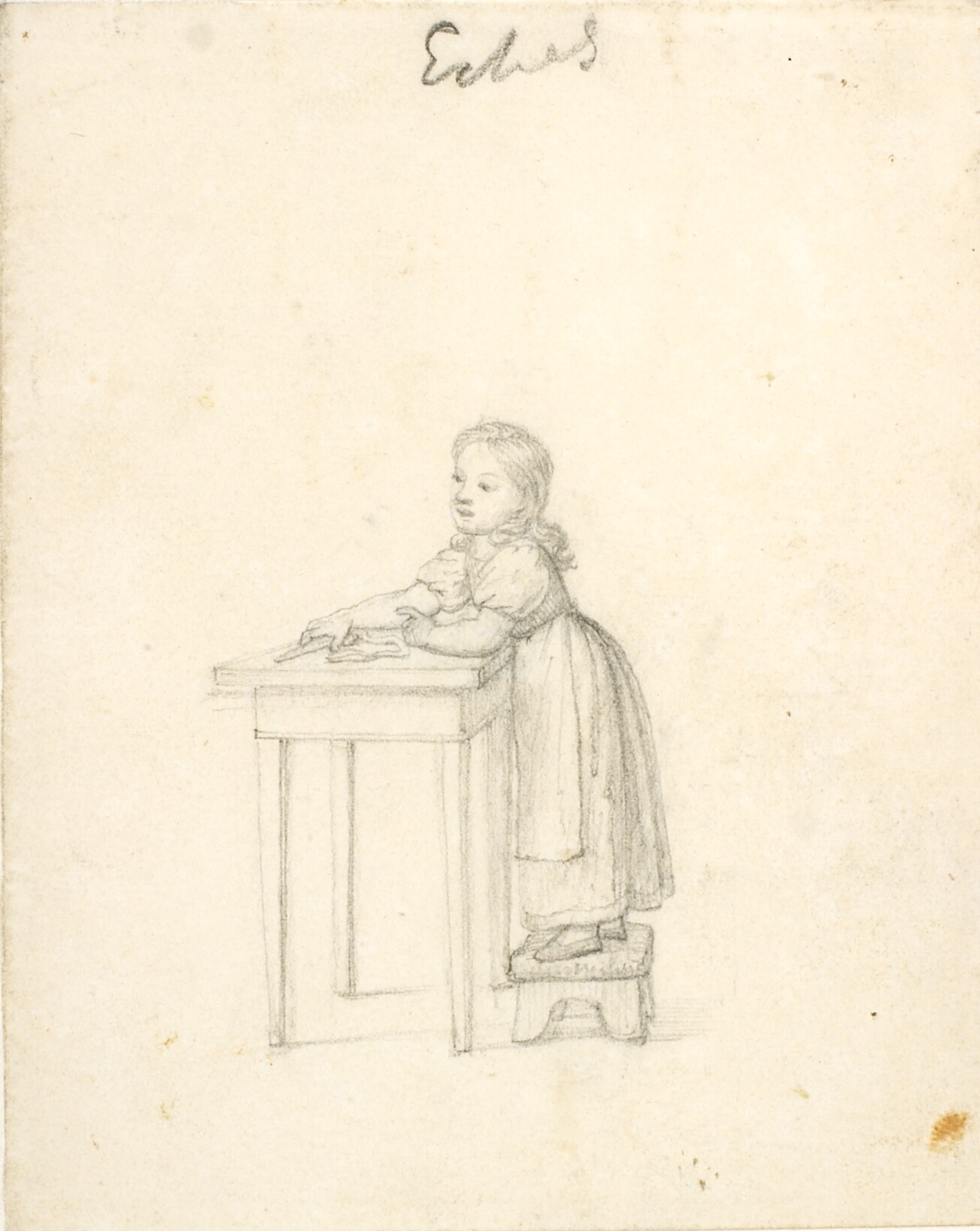 Lille pige stående på en skammel ved et bord