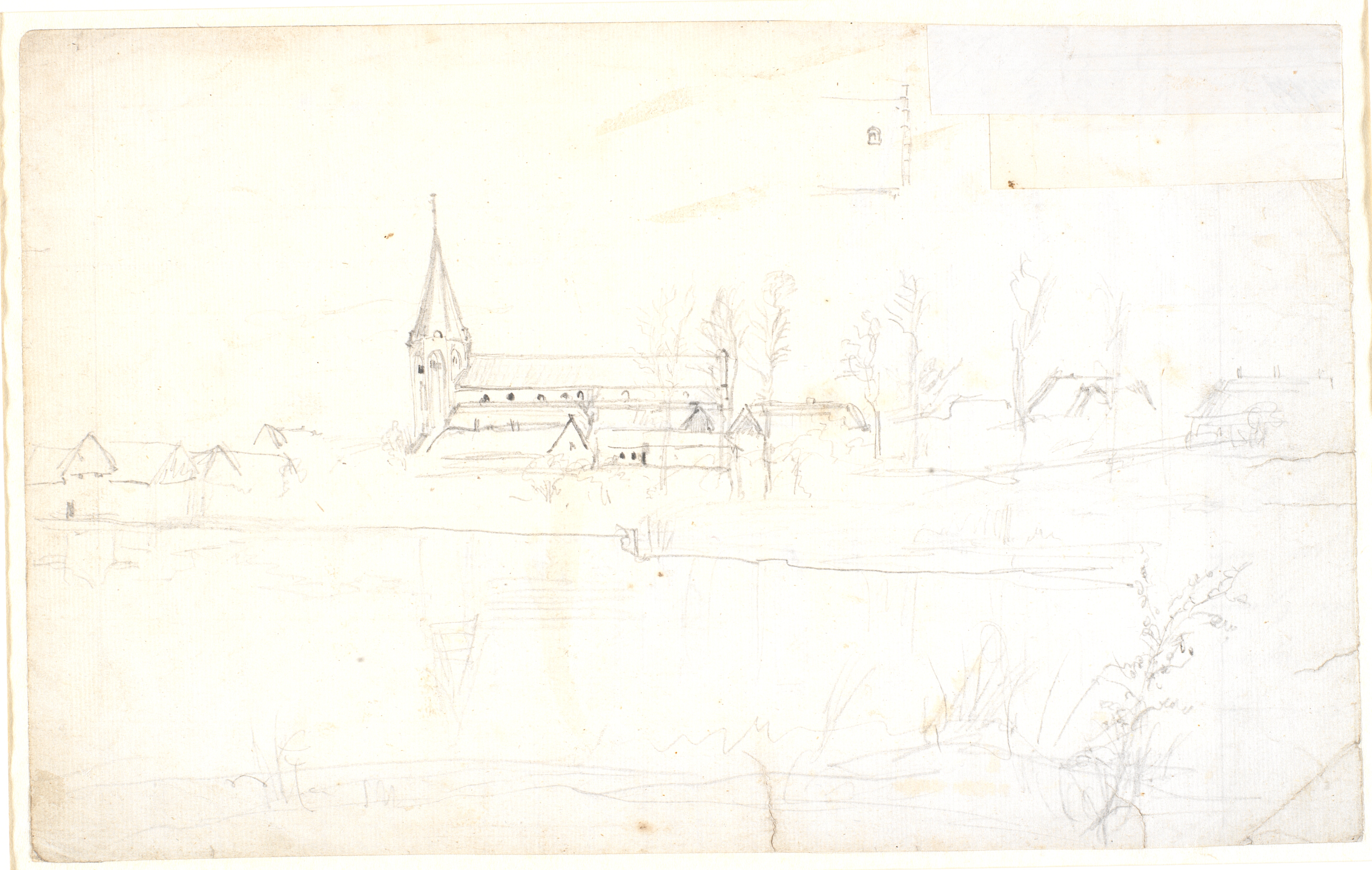 Kirke omgivet af huse og træer