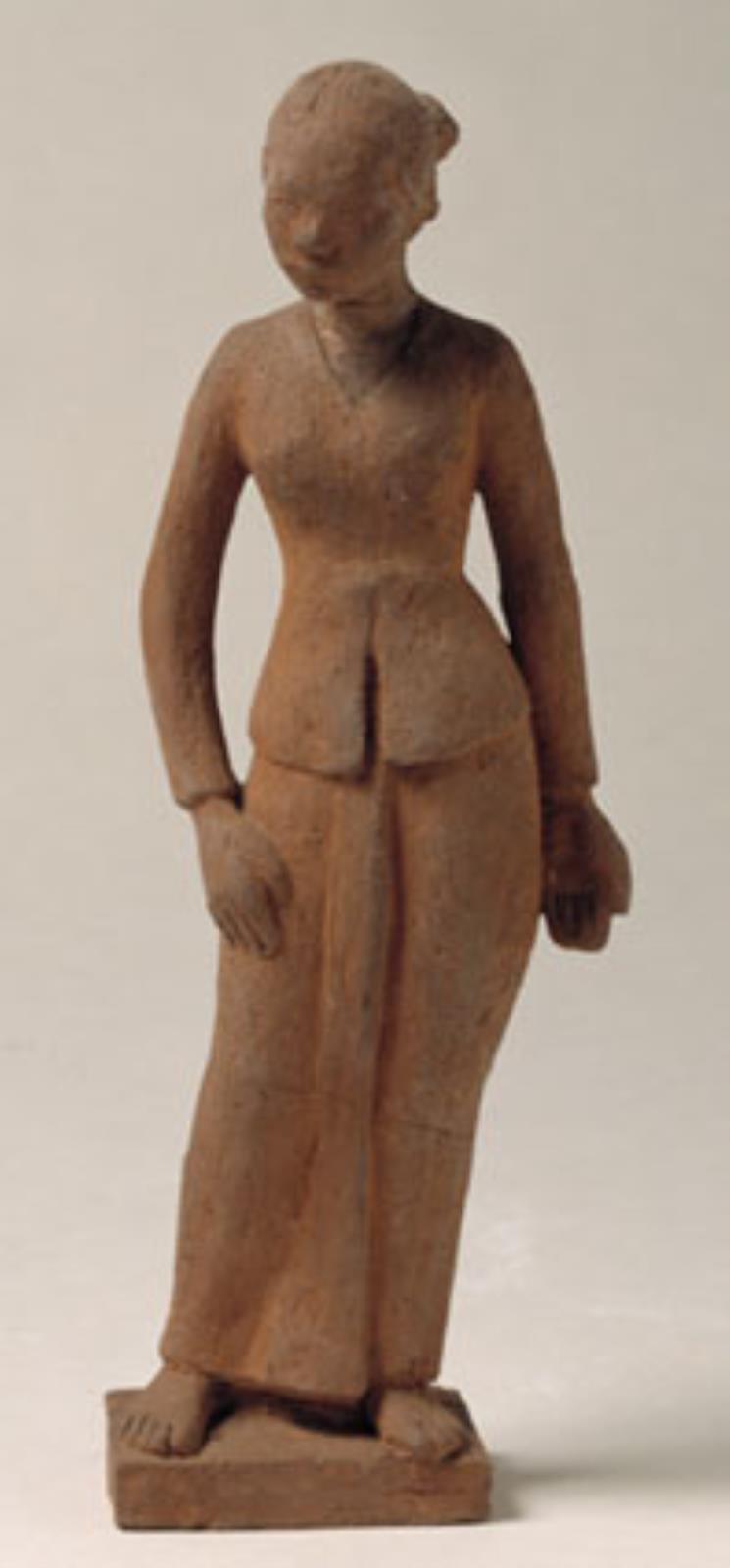 Stående malajkvinde