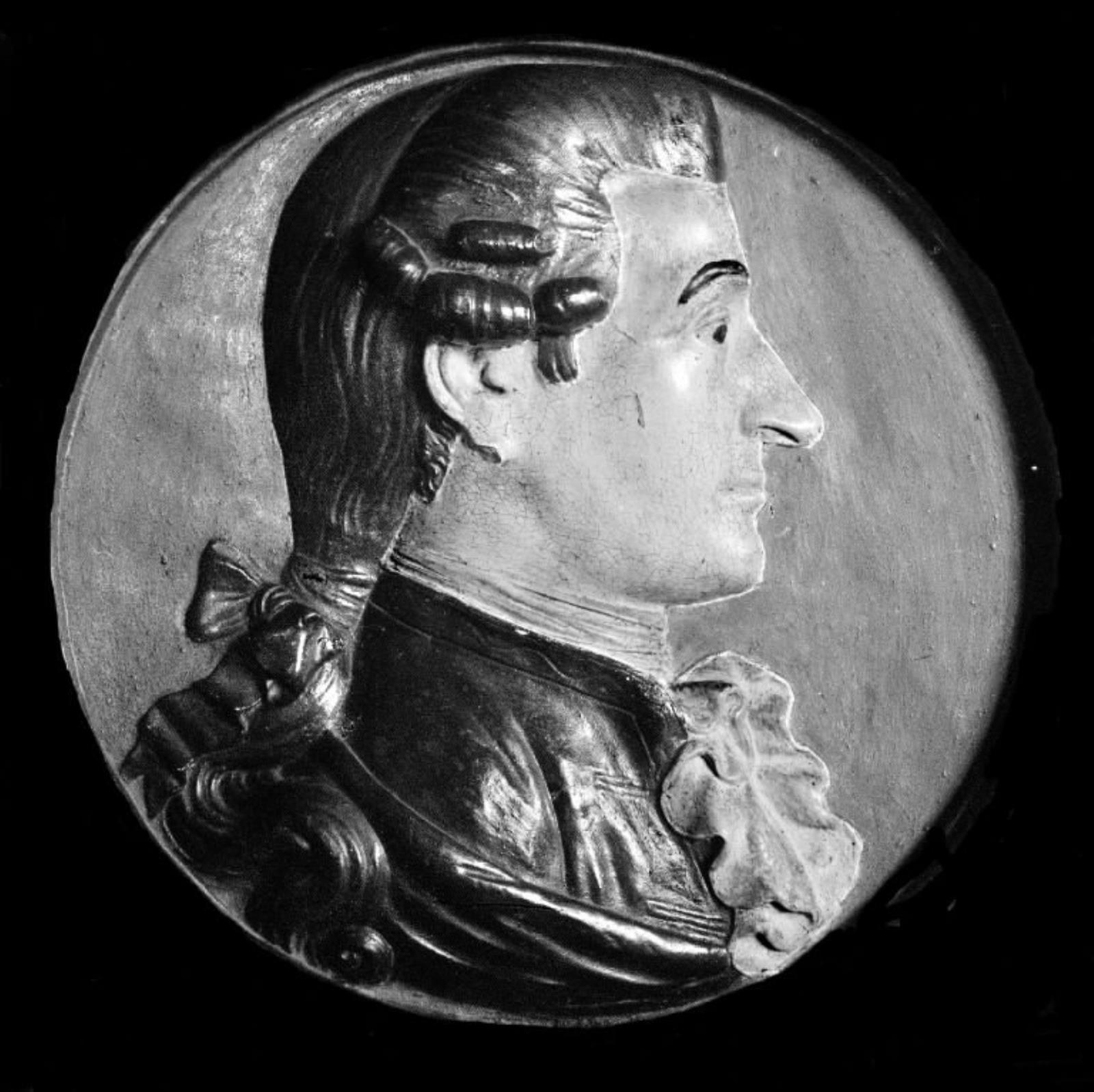 Medailleportræt i profil af en mand