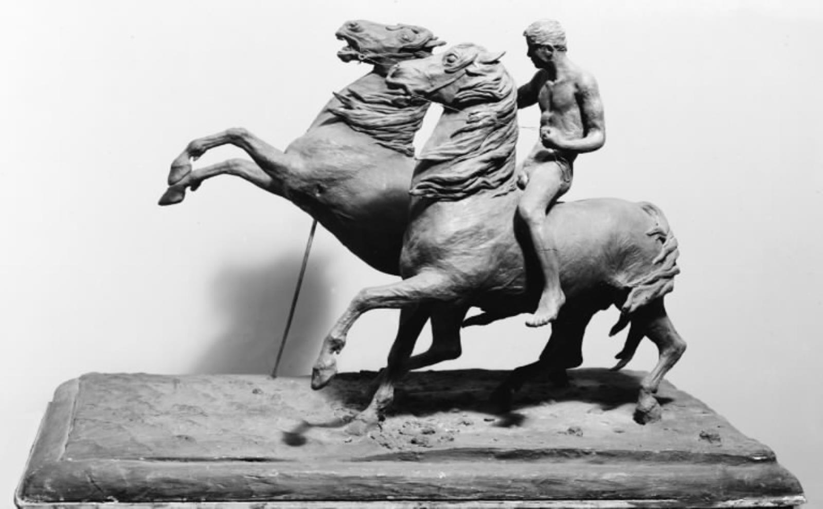 Karl rider to heste til vands