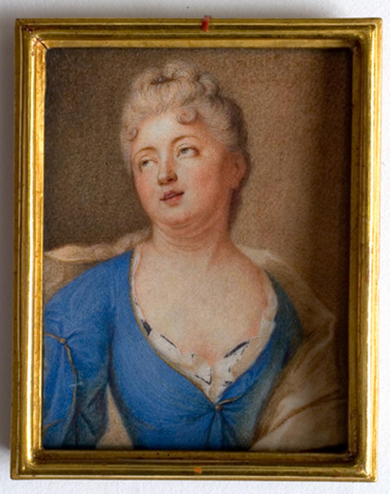 Dame i blåt liv, seende opad