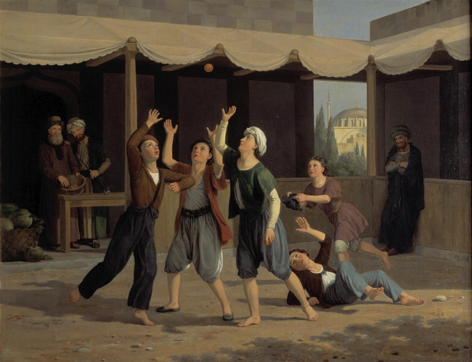 Aladdin griber imellem andre drenge efter de nedkastede pommeranser