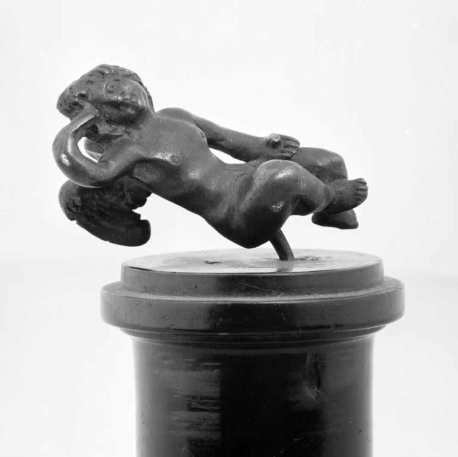 Siddende putto, Ubekendt, 1598-1602