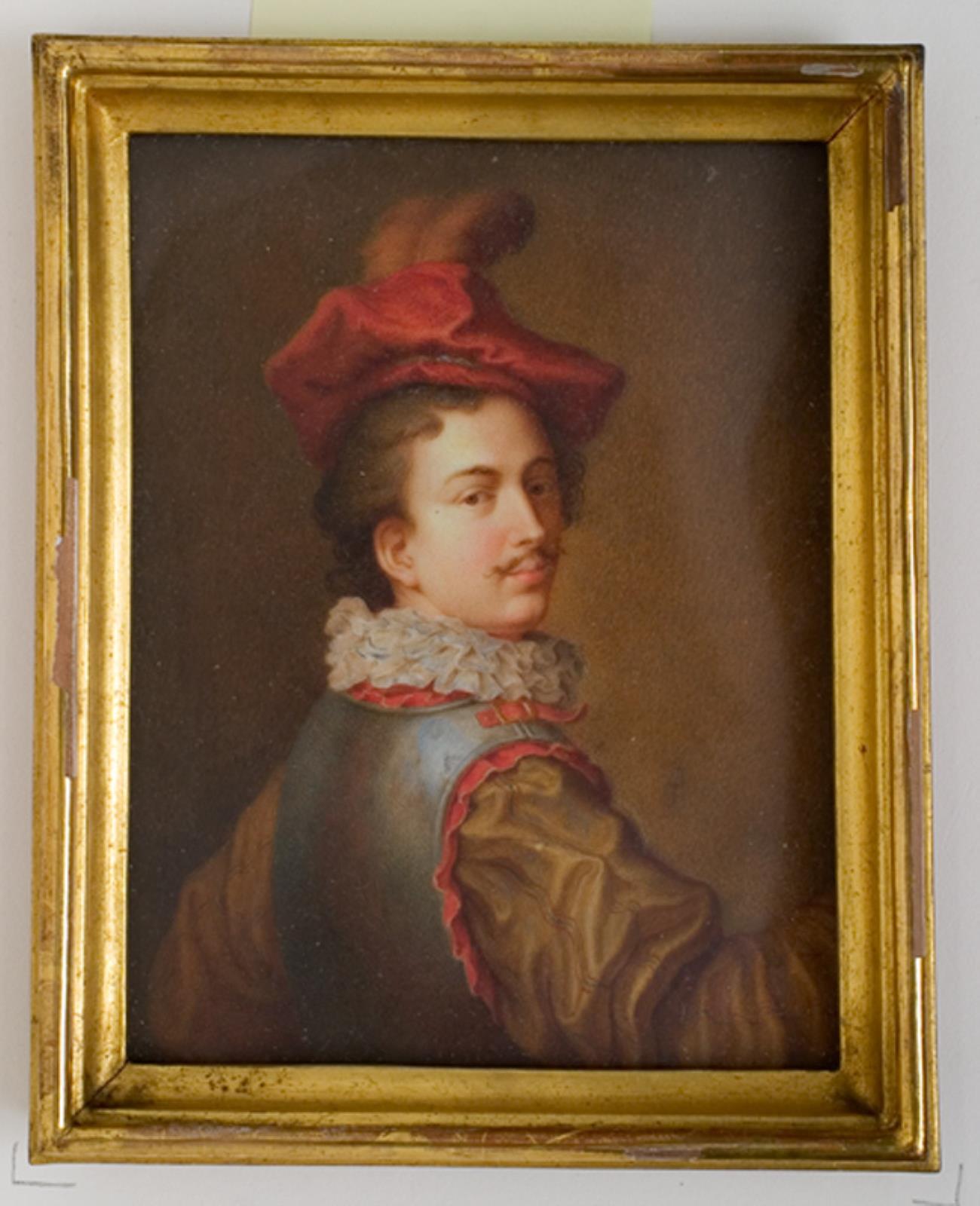 Herre med rød baret