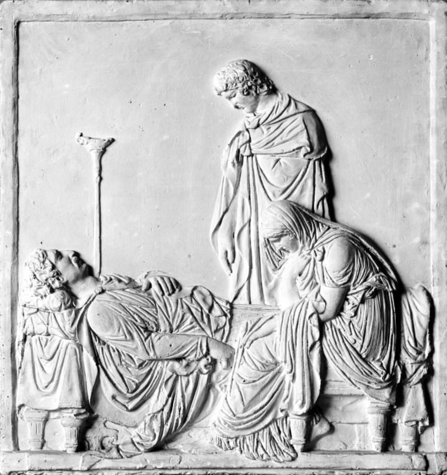 Afskeden. En stående og en siddende skikkelse ved et dødsleje