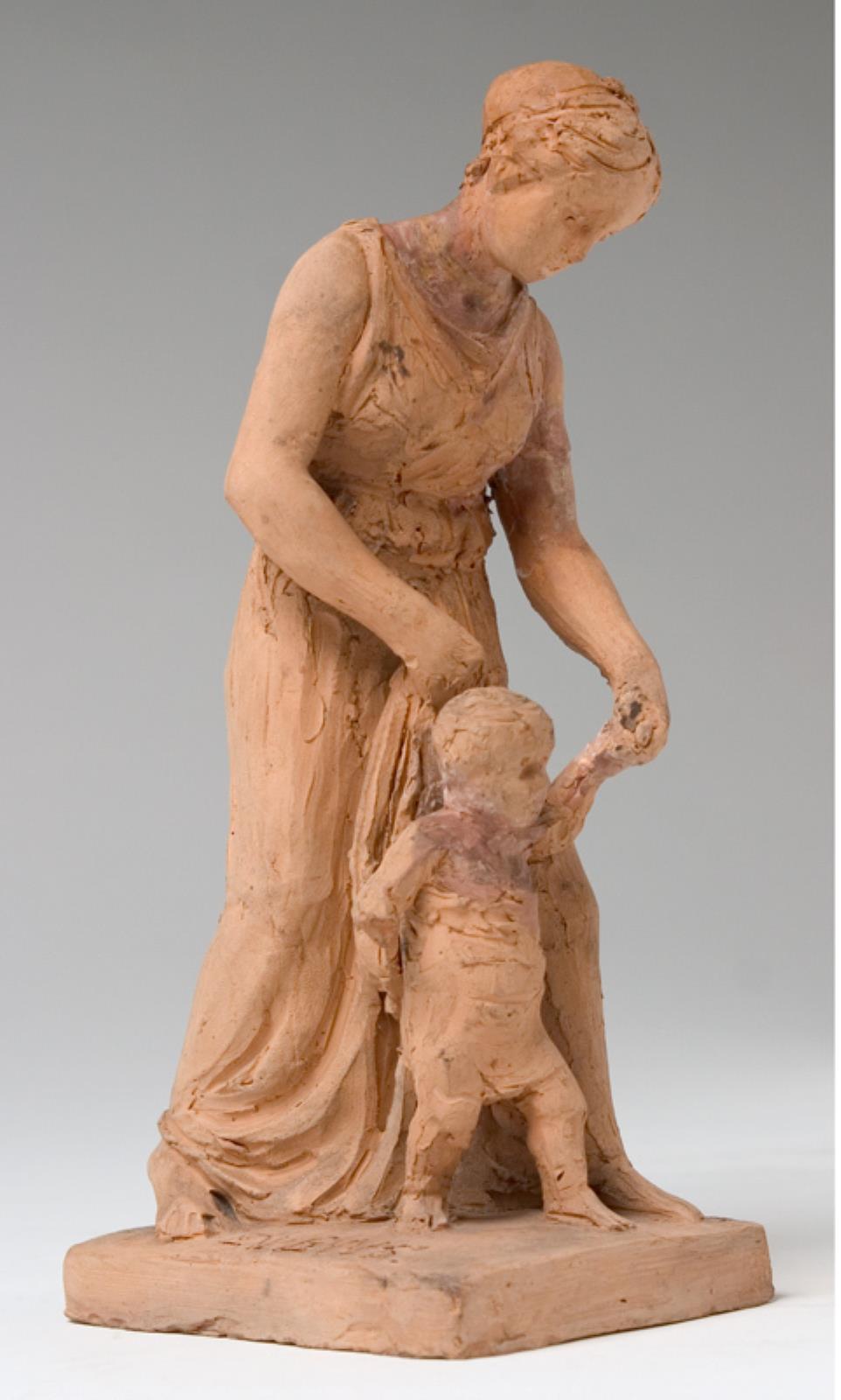 Moder og barn. Ung gående kvinde, der støtter sit lille gående barn