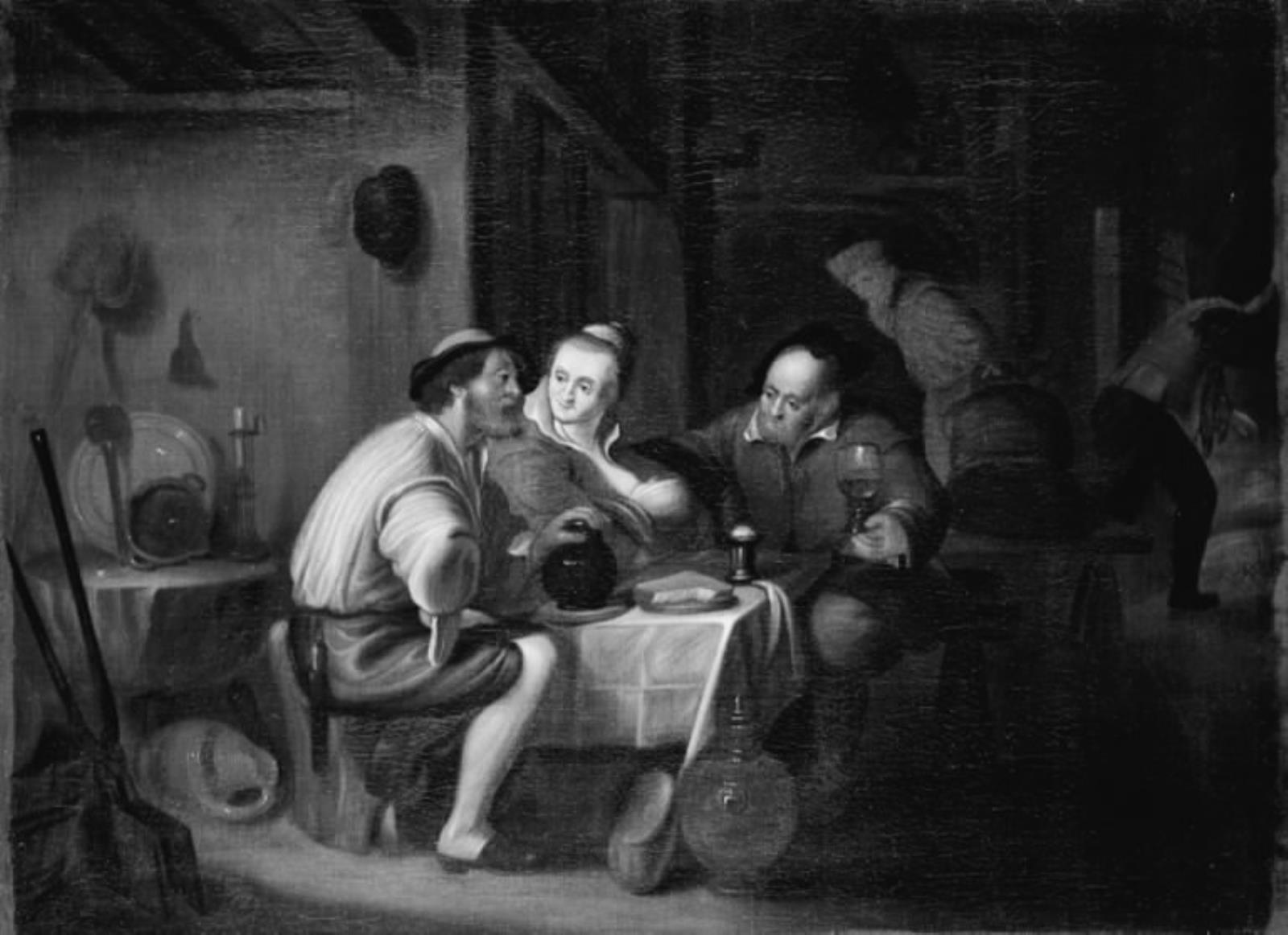 Tre personer ved et bord