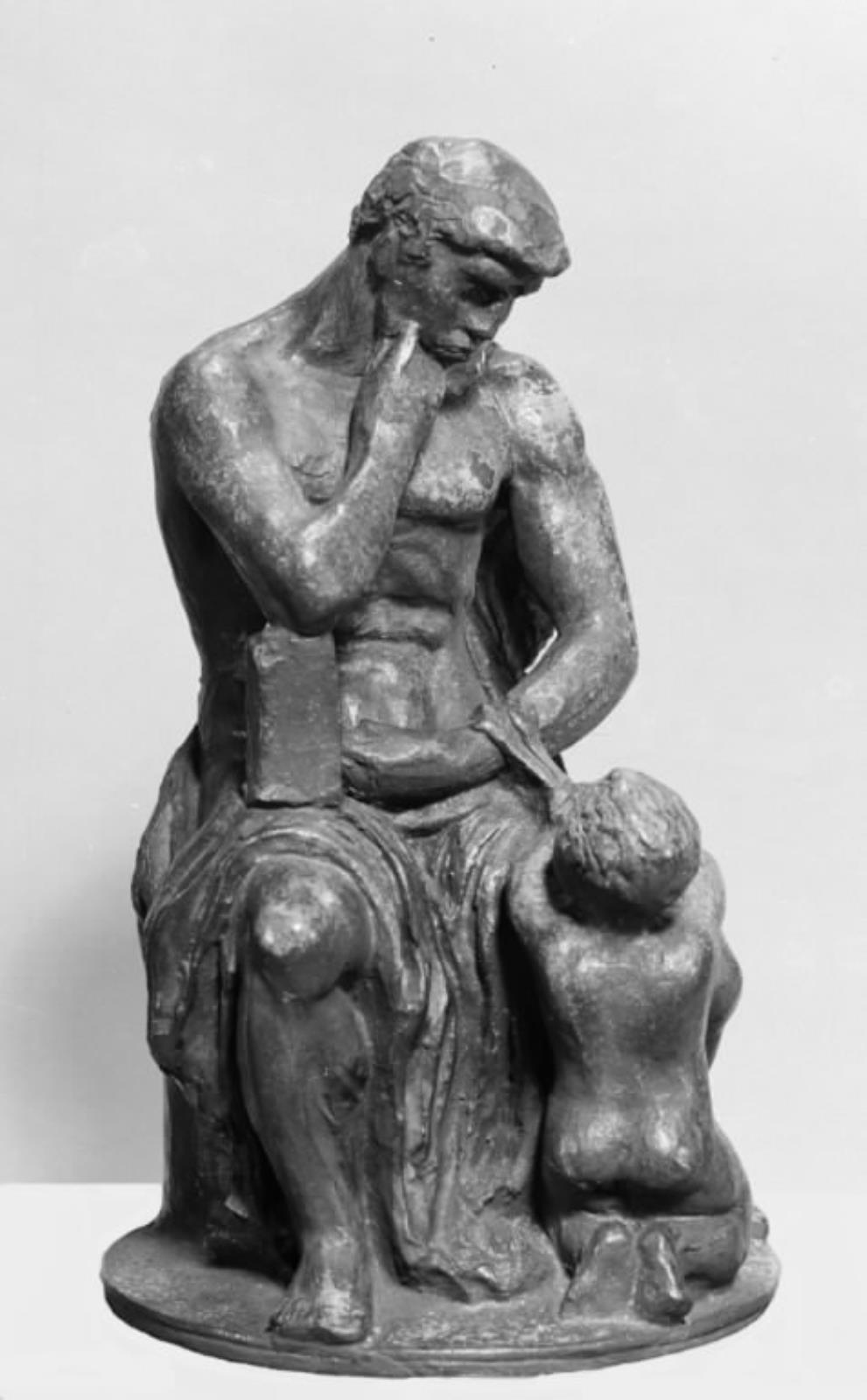 Sorgen. Siddende mand med knælende barn