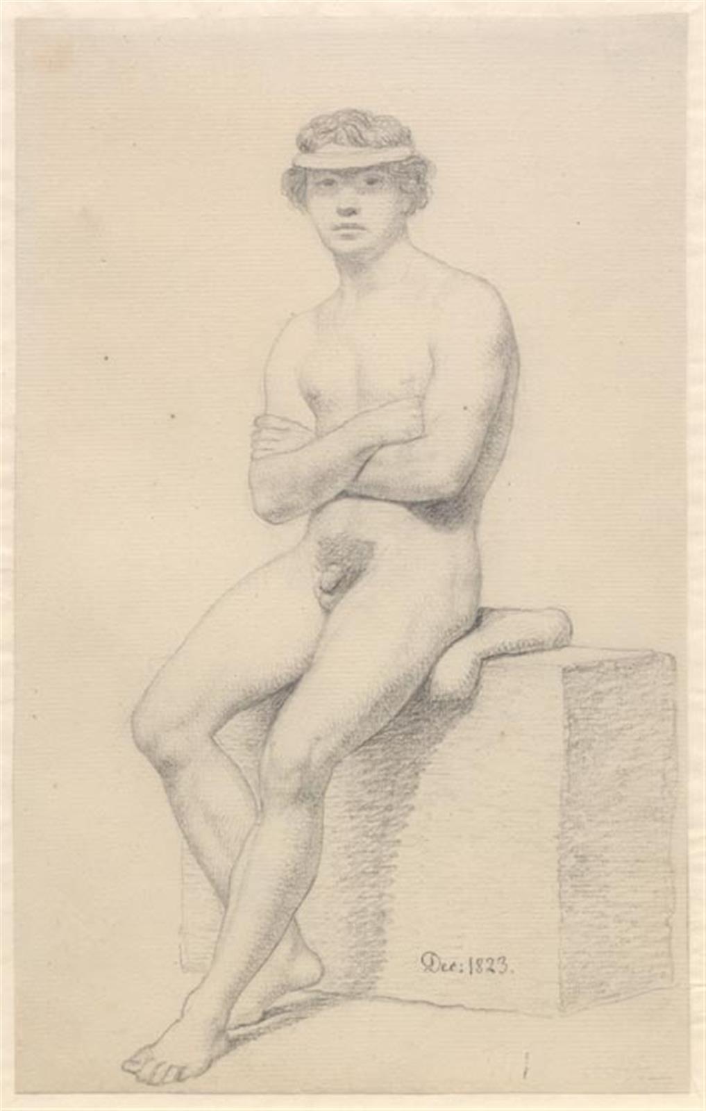 Siddende mandlig model.